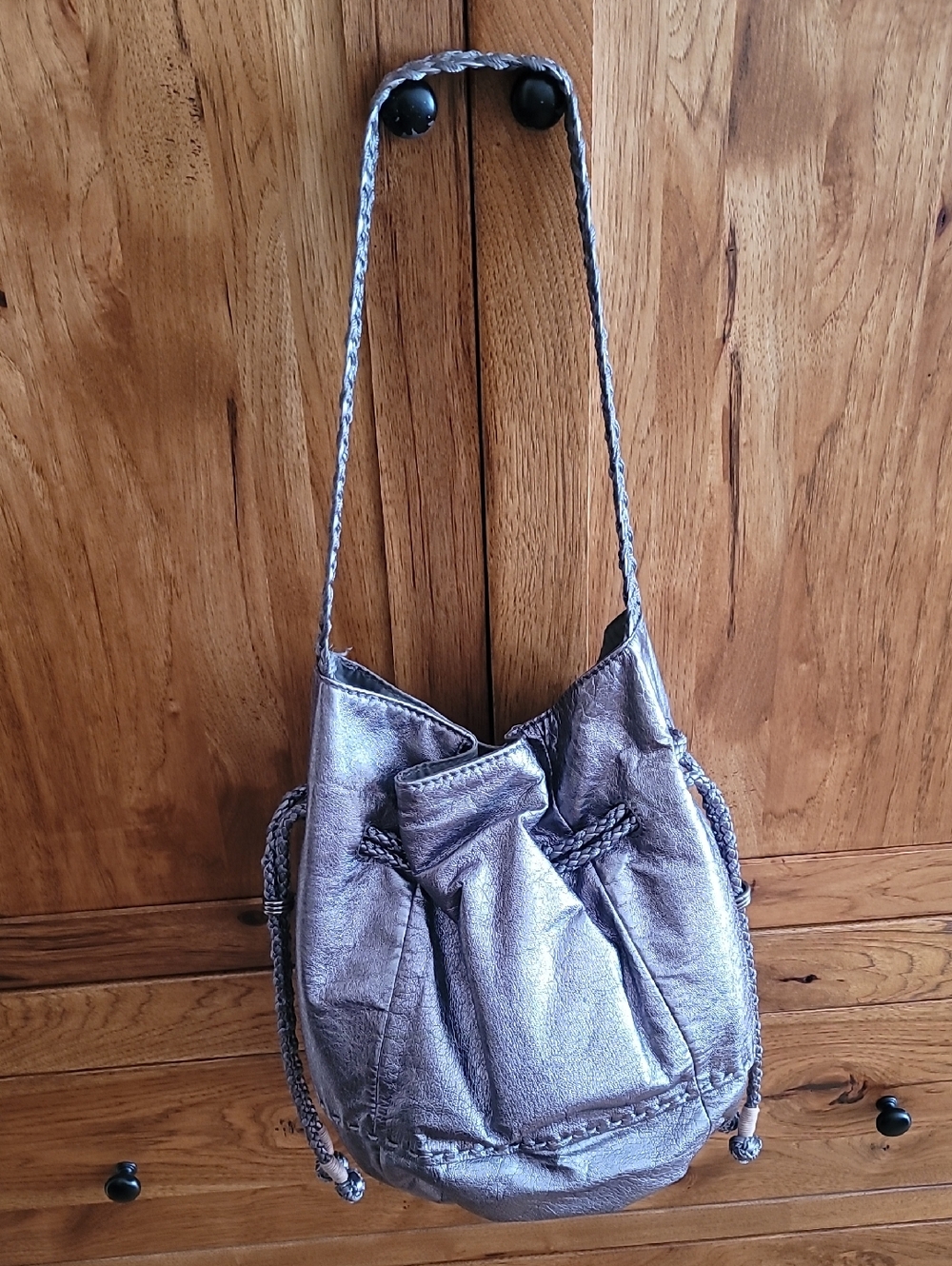 The Sak Metallic Silver Drawstring Shoulder Bag